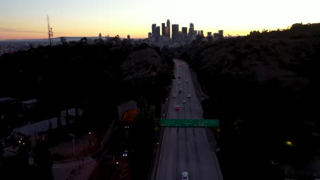 Night-Or-Dusk-Aerial-Over-The-110-Pasadena-Harbor-Freeway-And-Traffic-Leading-Into-Downtown-Los-Angeles-2