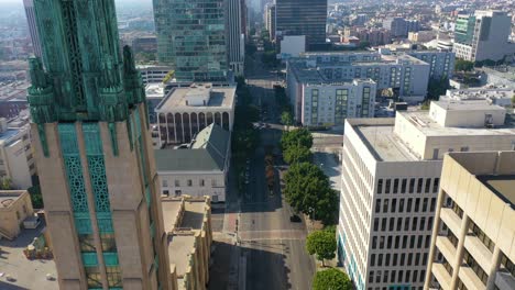 Aerial-Of-Wilshire-Blvd-In-Los-Angeles-Passing-The-Bullocks-Wilshire-Art-Deco-Building