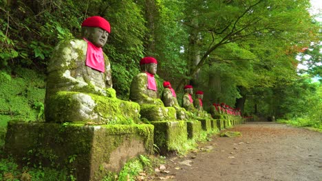 The-NarabiJizo-statues-are-seen-in-a-forested-area-of-Nikko-Japan-1