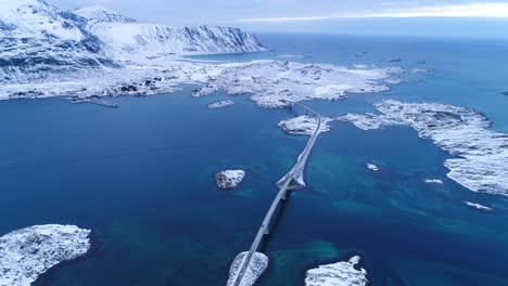An-Aerial-View-Shows-The-Wintry-Lofoten-Islands-Norway-Covered-In-Snow