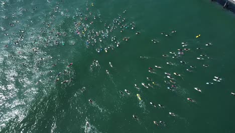 Aerial-over-surfers-in-circle-during-BLM-Black-Lives-Matter-Paddle-For-Freedom-gathering-in-California-2