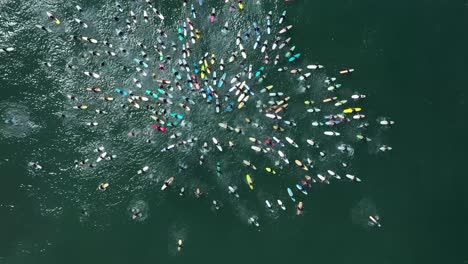 Aerial-over-surfers-in-circle-during-BLM-Black-Lives-Matter-Paddle-For-Freedom-gathering-in-California-3