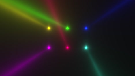 Animationsbewegung-Bunt-Leuchtende-Scheinwerferstrahlen-Auf-Dunklem-Hintergrund-In-Der-Bühne