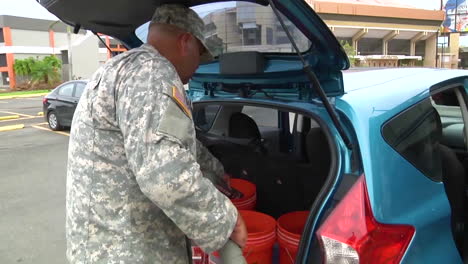 Water-And-Relief-Supplies-Are-Delivered-To-Victims-Of-Hurricane-Maria-In-Puerto-Rico-By-The-Us-National-Guard-2