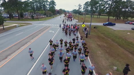 Aerial-Over-Us-Army-Recruits-Jogging-Down-A-Road-During-Basic-Training-1