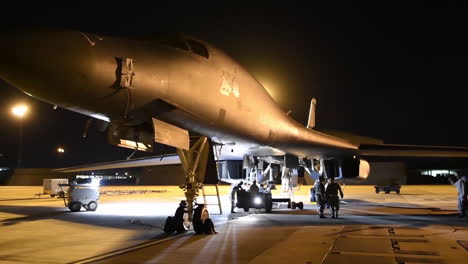 American-B1B-Nuclear-Bombers-Sit-On-The-Runway-At-An-Airbase-At-Night