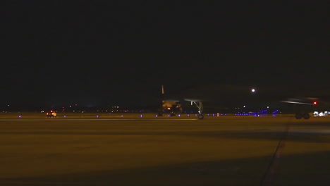 American-B1B-Nuclear-Bombers-Taxi-On-The-Runway-At-An-Airbase-At-Night-2