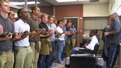 Time-Lapse-Of-New-Army-Recruits-Gettingtheir-Hair-Cut-And-Heads-Shaved-By-A-Barber-Before-Entering-Basic-Training