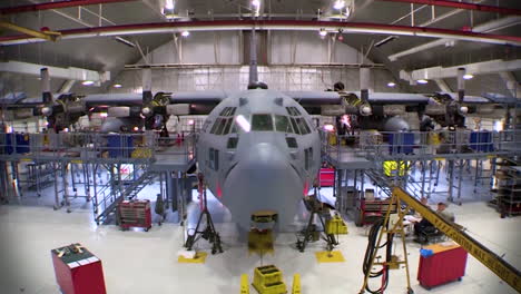 Time-Lapse-Of-C130-Hercules-Military-Airplane-In-A-Hangar-For-Maintenance