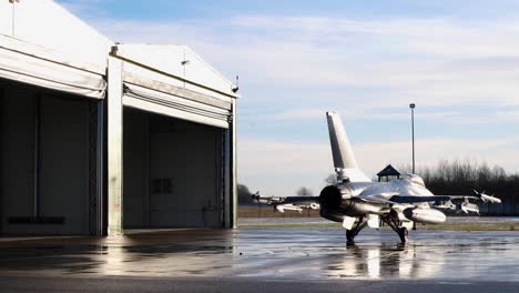 Jets-From-The-Royal-Danish-Air-Force-Are-Steered-Into-Hangars-At-_Iauliai-Air-Base-In-Lithuania