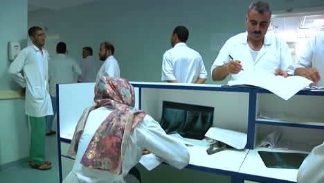 Doctors-At-The-Afghanistan-Regional-Military-Hospital-Check-In-With-Nurses-At-The-Desk