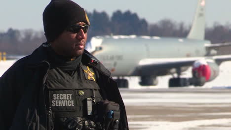 A-Secret-Service-Member-Is-Seen-At-The-Pennsylvania-Air-National-Guards-171St-Air-Refueling-Wing-As-Air-Force-One-Taxis