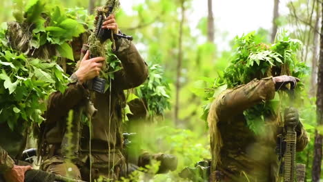 Camouflaged-Students-At-Fort-Bennings-Sniper-School-Rise-In-The-Forest