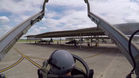 A-Camera-Stationed-Above-And-Behind-The-Pilot-In-The-Cockpit-Of-A-T38C-Shows-The-View-As-The-Aircraft-Taxiis-At-An-Air-Force-Base