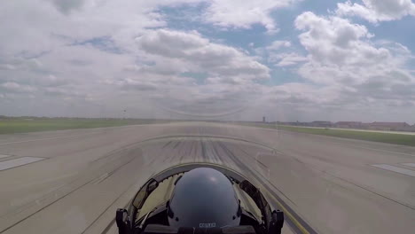 A-Camera-Stationed-Above-And-Behind-The-Pilot-In-The-Cockpit-Of-A-T38C-Shows-The-View-As-The-Aircraft-Takes-Off-From-An-Air-Force-Base