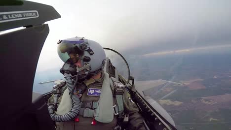 Cockpit-View-Of-A-F16-Fighter-Pilot-As-He-Makes-Sharp-Turns-In-the-Sky-2019