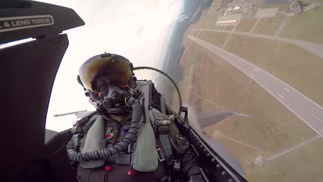 Cockpit-View-Of-A-F16-Fighter-Pilot-As-He-Makes-Sharp-Turns-Low-To-the-Ground-2019