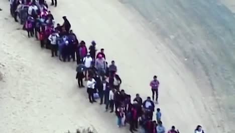 376-Migrants-Line-Up-To-Illegaly-Enter-Yuma-Az-2019