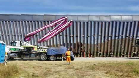 Us-Army-Corps-Of-Engineers-Contractors-Use-A-Concrete-Pump-Truck-To-Place-Concrete-For-the-Foundation-Of-the-San-Diego-Border-Wall