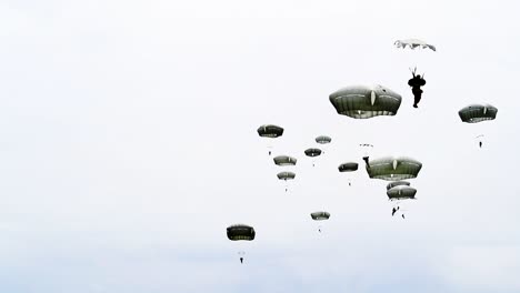 A-Bunch-Of-Paratroopers-As-they-Fall-From-the-Sky-Near-Saintemereeglise-France-For-the-75th-Commemoration-Of-Dday-June-9th-2019