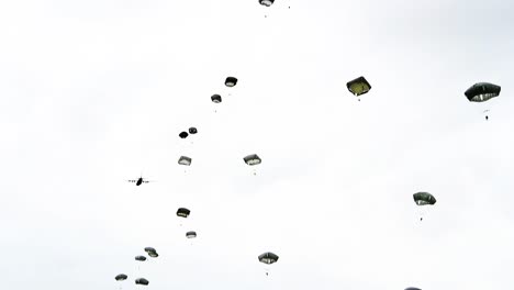 Paratroopers-As-they-Jump-Out-Of-A-World-War-Ii-Era-Plane-Near-Saintemereeglise-France-For-the-75th-Commemoration-Of-Dday-June-9th-2019