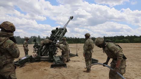 Soldiers-Assigned-To-A-Field-Artillery-Regiment-Train-By-Loading-And-Firing-A-M777-Howitzer-At-Fort-Bragg-North-Carolina-1