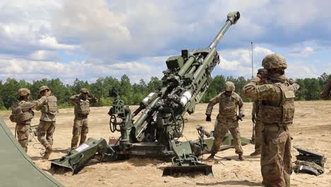 Soldiers-Assigned-To-A-Field-Artillery-Regiment-Train-By-Loading-And-Firing-A-M777-Howitzer-At-Fort-Bragg-North-Carolina-3