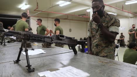 An-African-American-Marines-With-Combat-Logistics-Battalion-4-Takes-A-Machine-Gun-Class-At-Camp-Kinser-Okinawajapan