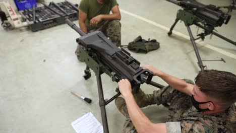 Us-Marines-With-Combat-Logistics-Battalion-4-Take-A-Machine-Gun-Class-Taught-By-Fellow-Marines-At-Camp-Kinser-Japan-1