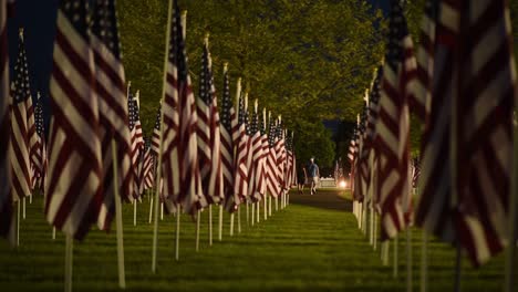 Slow-Motion-Of-Flags-And-Visitors-To-A-Memorial-Day-Field-Of-Heroes-Display-In-Honoring-Americas-War-Dead-1