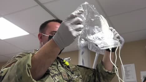 Masked-332-Air-Expeditionary-Wing-Medical-Group-Airmen-Blood-Transfusion-Training-During-Covid19-Pandemic-1
