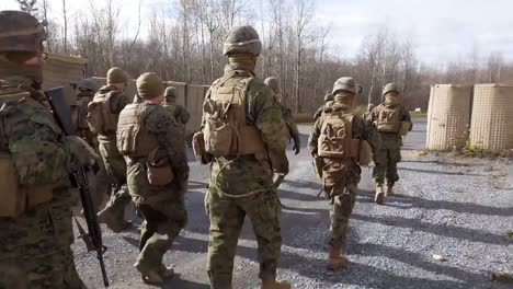 Us-Marines-Soldiers-March-And-Fire-Weapons-In-Fire-Team-Immediate-Action-Drills-At-Fort-Drum-New-York