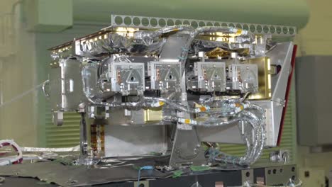 Scientists-Work-In-A-Heavily-Controlled-Lab-To-Prepare-A-Satellite-At-Nasa-1