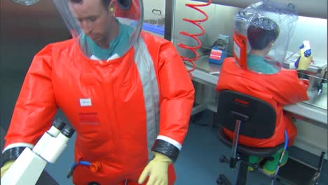 Cdc-Center-For-Disease-Control-Scientists-Wear-Biohazard-Suits-To-Study-Deadly-Viruses-In-A-Lab-8