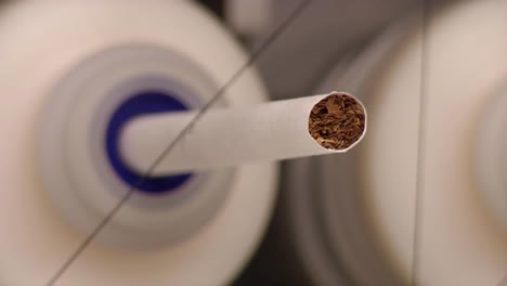Scientists-At-The-Cdc-Center-For-Disease-Control-Use-Laboratory-Equipment-And-An-Artificial-Smoking-Machine-To-Collect-And-Analyze-The-Particulate-Matter-And-Chemicals-Found-In-Tobacco-Products-1