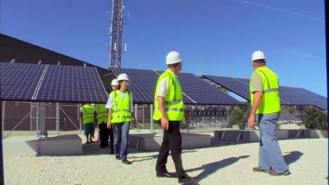 A-Maintenance-Team-Works-On-Solar-Panel-Arrays-1