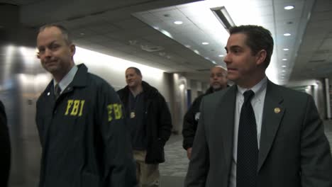 Fbi-Agents-And-Homeland-Security-Walk-Through-An-Airport