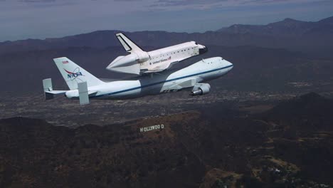 The-Final-Voyage-Of-Space-Shuttle-Enterprise-Flying-Over-Downtown-Los-Angeles-And-The-Hollywood-Sign