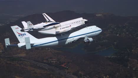 The-Final-Voyage-Of-Space-Shuttle-Enterprise-Flying-Over-Downtown-Los-Angeles-And-The-Hollywood-Sign-1