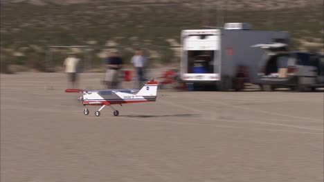 A-Small-Drone-Airplane-Lands-In-The-Desert