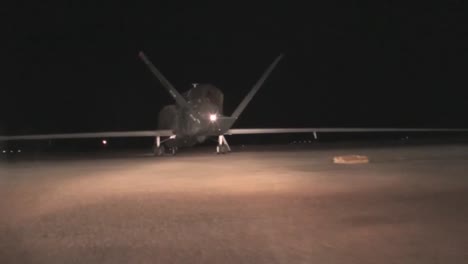 The-Rq4-Drone-Surveillance-Aircraft-Is-Rolled-Out-At-Night-And-Prepared-For-A-Mission-3