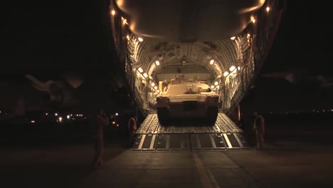Airmen-Prepare-Secure-And-Transport-A-Usmc-M1A1-Abrams-Tank-To-Afghanistan-Aboard-A-C17-Globemaster-2