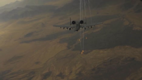 An-A10-Warthog-Release-Flares-At-A-High-Altitude-Then-Peels-Away