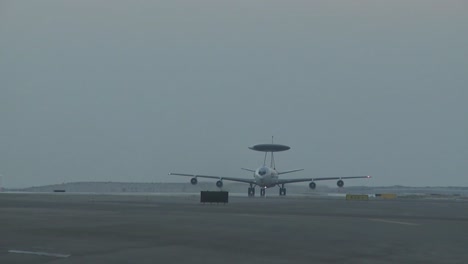 A-Us-Air-Force-E3-Sentry-Awacs-Plane-Lands-And-Taxis-On-A-Runway