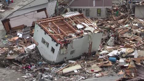 Search-And-Rescue-Teams-Hunt-For-Survivors-Following-The-Devastating-Earthquake-And-Tsunami-In-Japan-In-2012