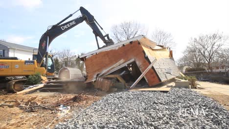 A-Suburban-Home-Is-Torn-Down-1