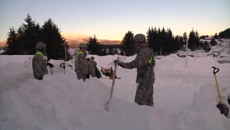 Us-Army-National-Guard-Dig-Out-Residents-Of-Cordova-Alaska-After-A-Major-Snowstorm