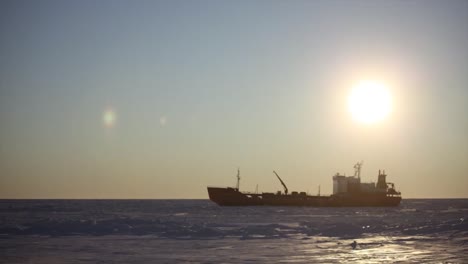 Time-Lapse-Fast-Motion-Of-A-Coast-Guard-Icebreaker-Boat-Cutting-Its-Way-Around-As-Tuck-Commercial-Ship