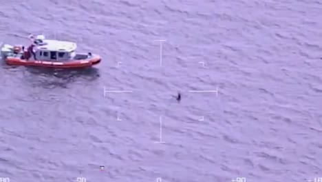 The-Coast-Guard-Rescues-Two-Men-From-A-Capsized-Canoe-1