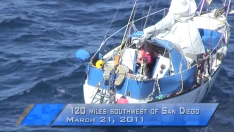 News-Style-Footage-Of-A-Rescue-Of-A-Man-And-His-Dog-From-A-Disabled-Sailboat